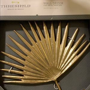 Cast metal palm leaf wall decor